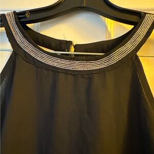 Elegant Black Sleeveless Top with Silver Accents